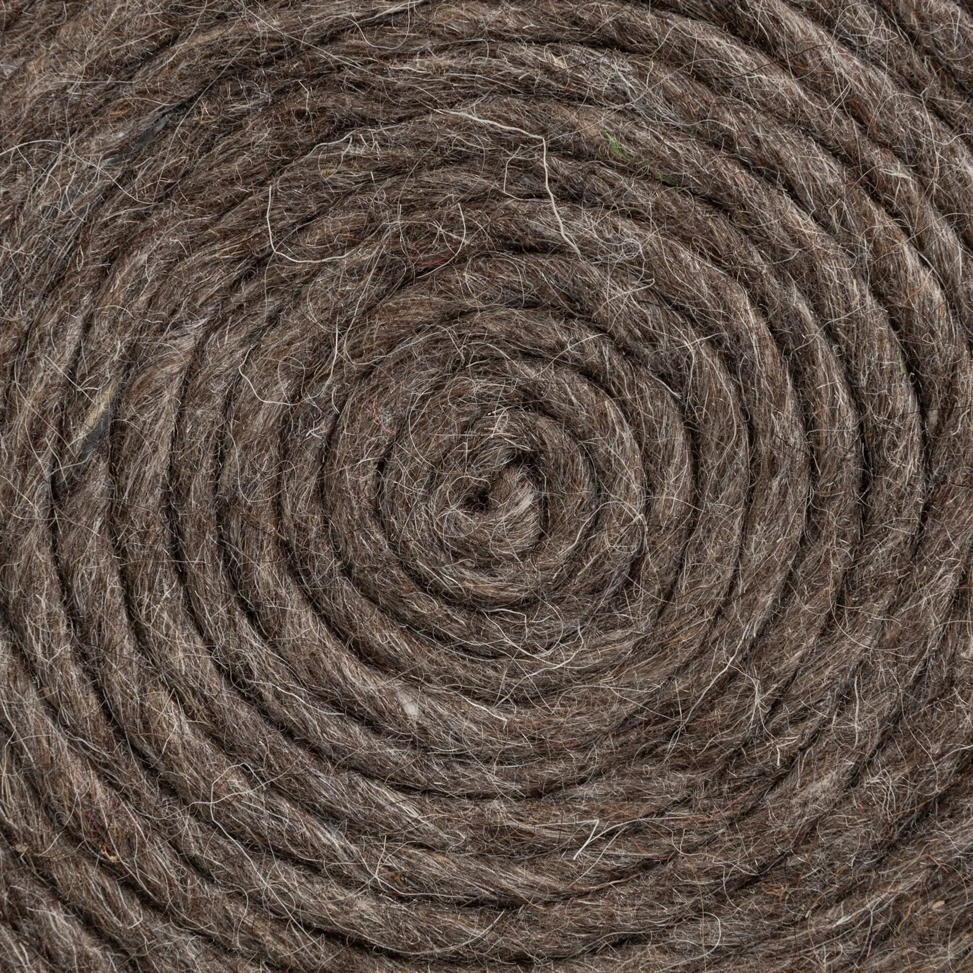 Allium Pouf by Mercana. Made from handwoven wool in a eclectic & global style.