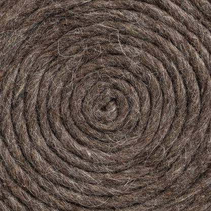 Allium Pouf by Mercana. Made from handwoven wool in a eclectic & global style.