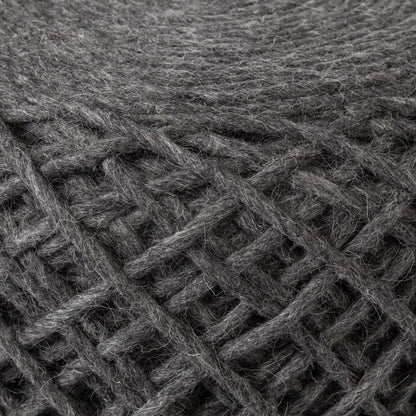 Allium Pouf by Mercana. Made from handwoven wool in a eclectic & global style.