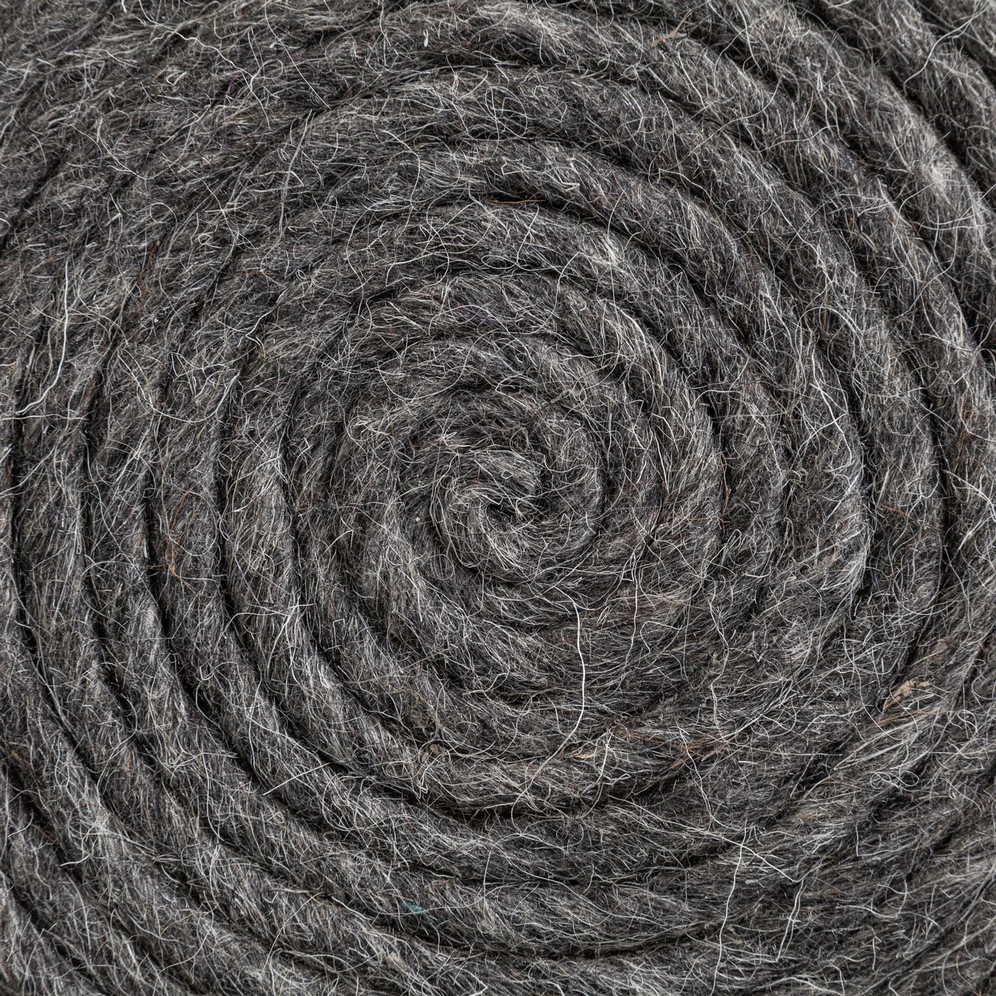 Allium Pouf by Mercana. Made from handwoven wool in a eclectic & global style.