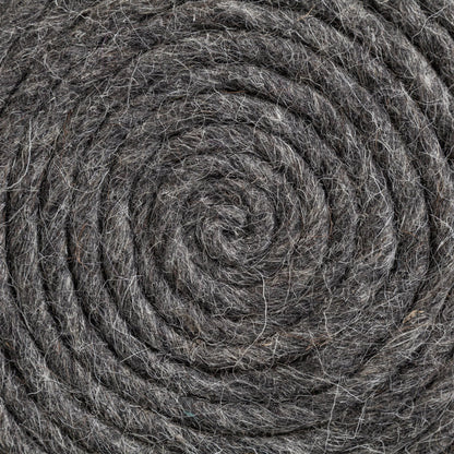Allium Pouf by Mercana. Made from handwoven wool in a eclectic & global style.