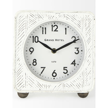 Karl Rustic Iron Rounded Square Table Clock by Mercana in white. Made from iron in a unique style.