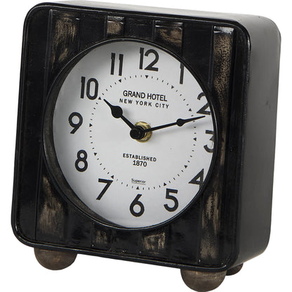 Karl Table Clock by Mercana in black. Made from metal in a unique style.