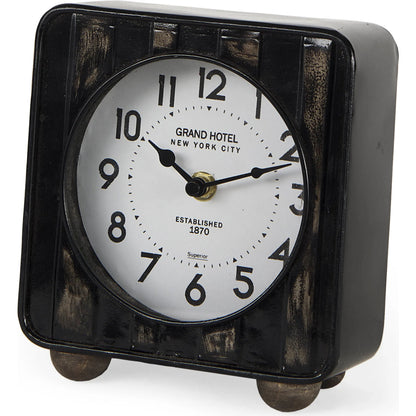 Karl Table Clock by Mercana in black. Made from metal in a unique style.