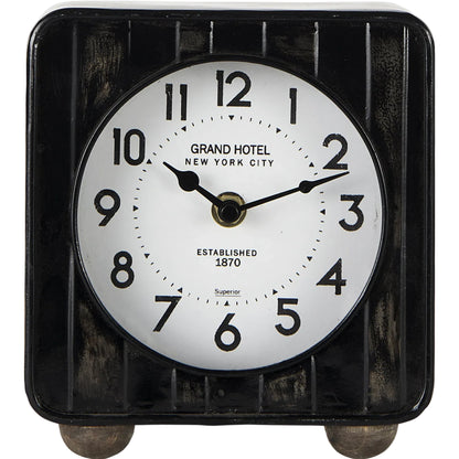 Karl Table Clock by Mercana in black. Made from metal in a unique style.