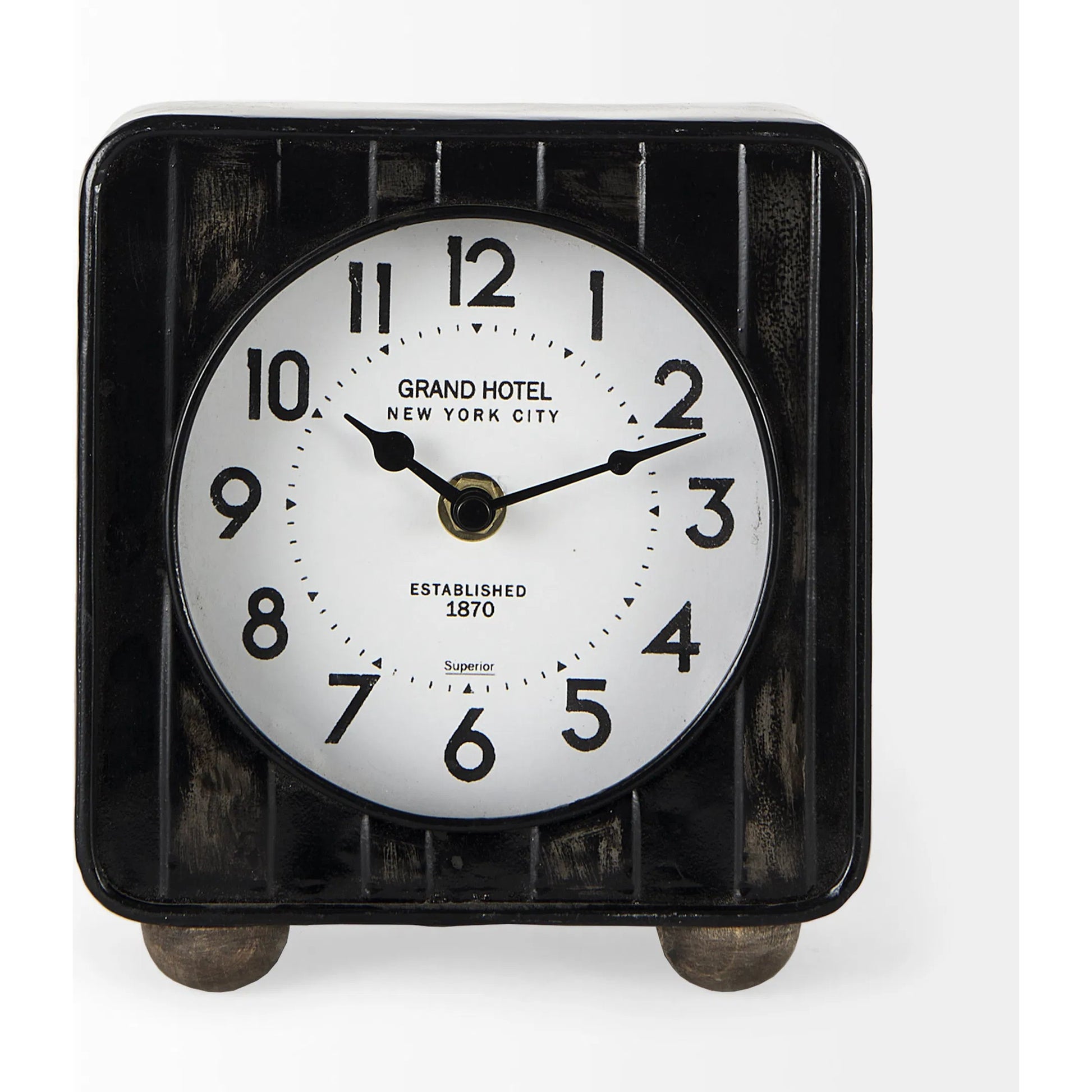 Karl Table Clock by Mercana in black. Made from metal in a unique style.
