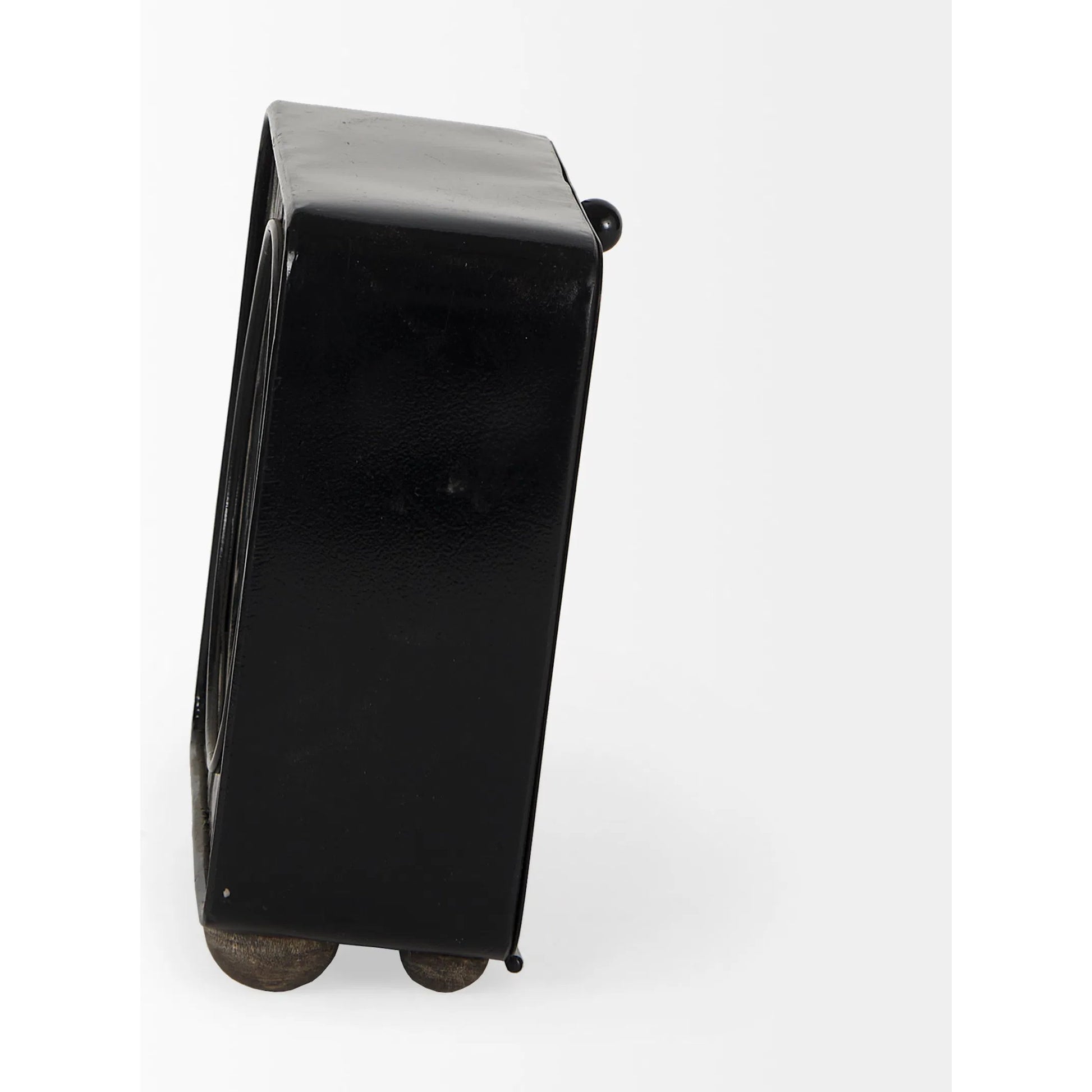 Karl Table Clock by Mercana in black. Made from metal in a unique style.