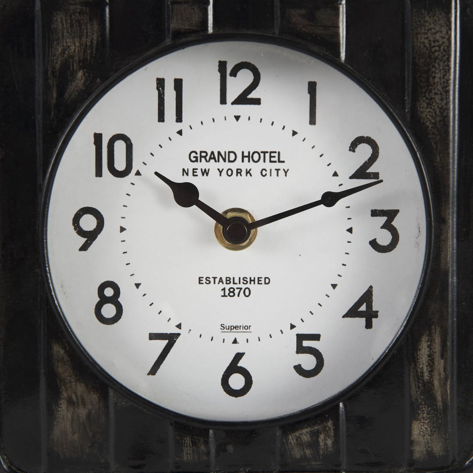 Karl Table Clock by Mercana in black. Made from metal in a unique style.
