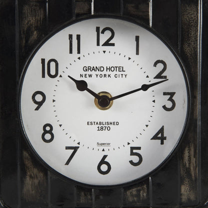 Karl Table Clock by Mercana in black. Made from metal in a unique style.