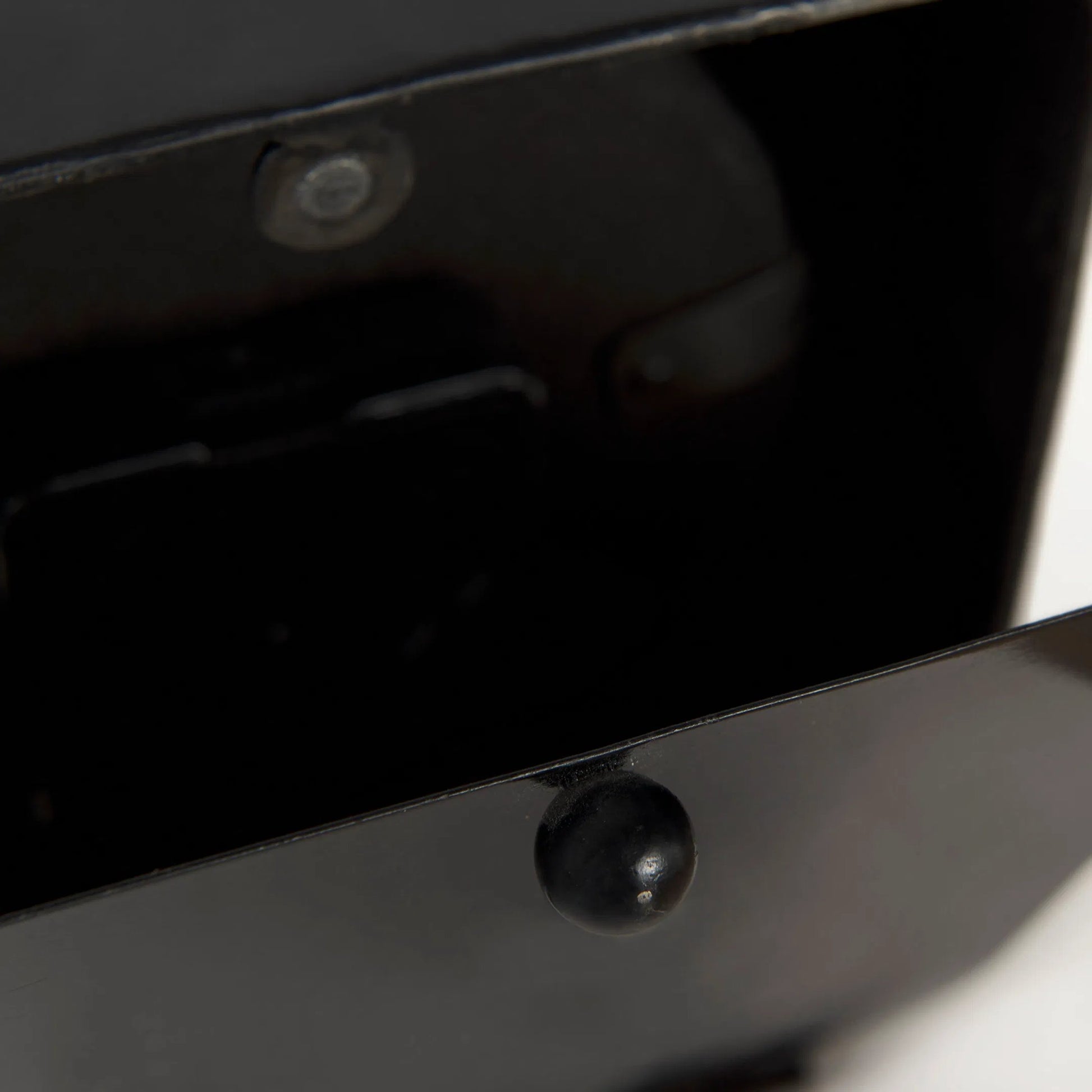 Karl Table Clock by Mercana in black. Made from metal in a unique style.