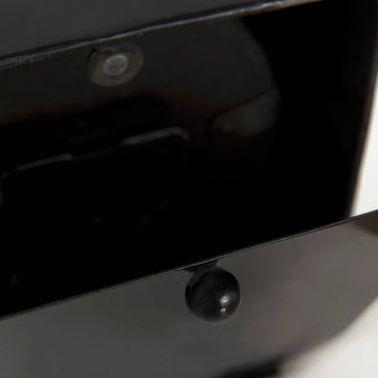 Karl Table Clock by Mercana in black. Made from metal in a unique style.