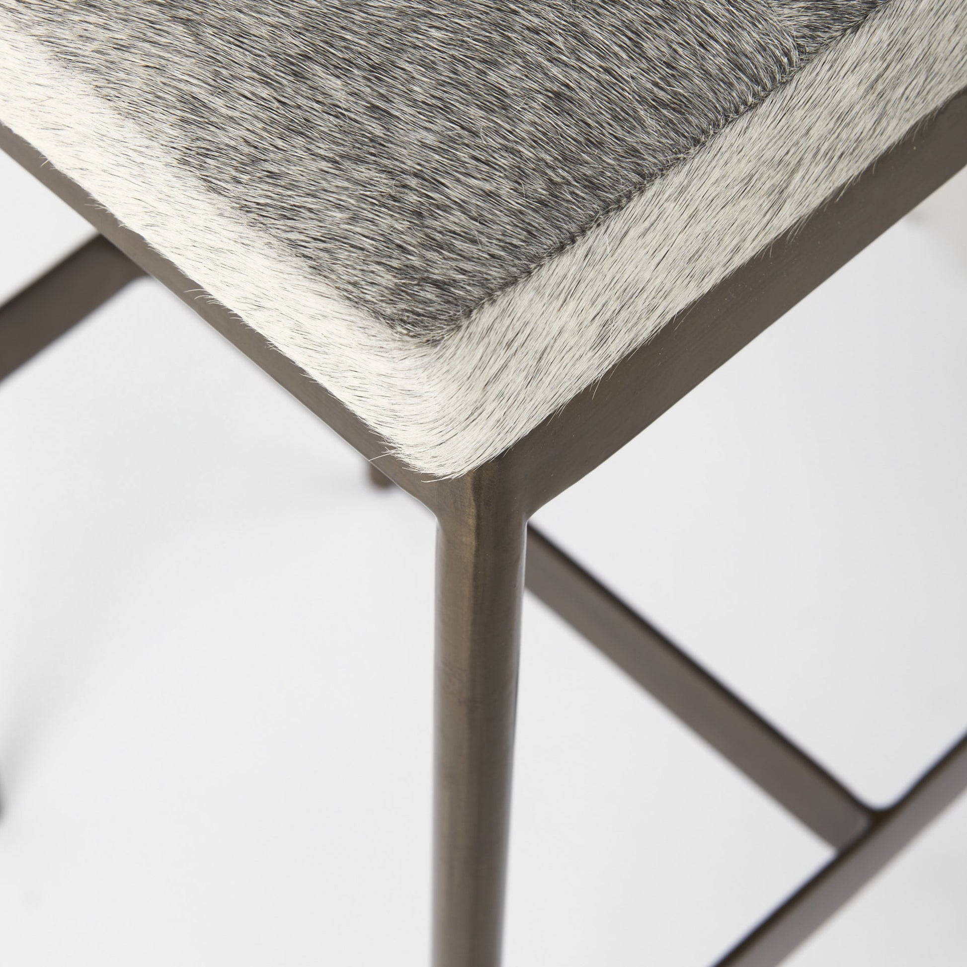 Millie Hide Seat Bar/Counter Stool by Mercana. Made from metal in a modern style.