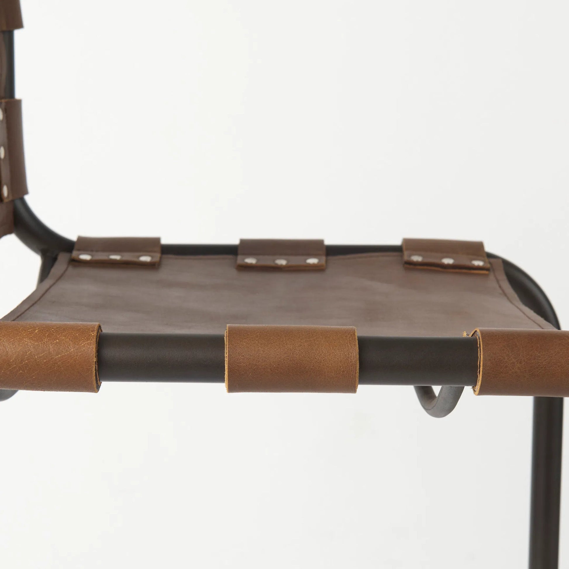 Berbick Leather Seat Bar Stool by Mercana. Made from leather, iron in a rustic style.