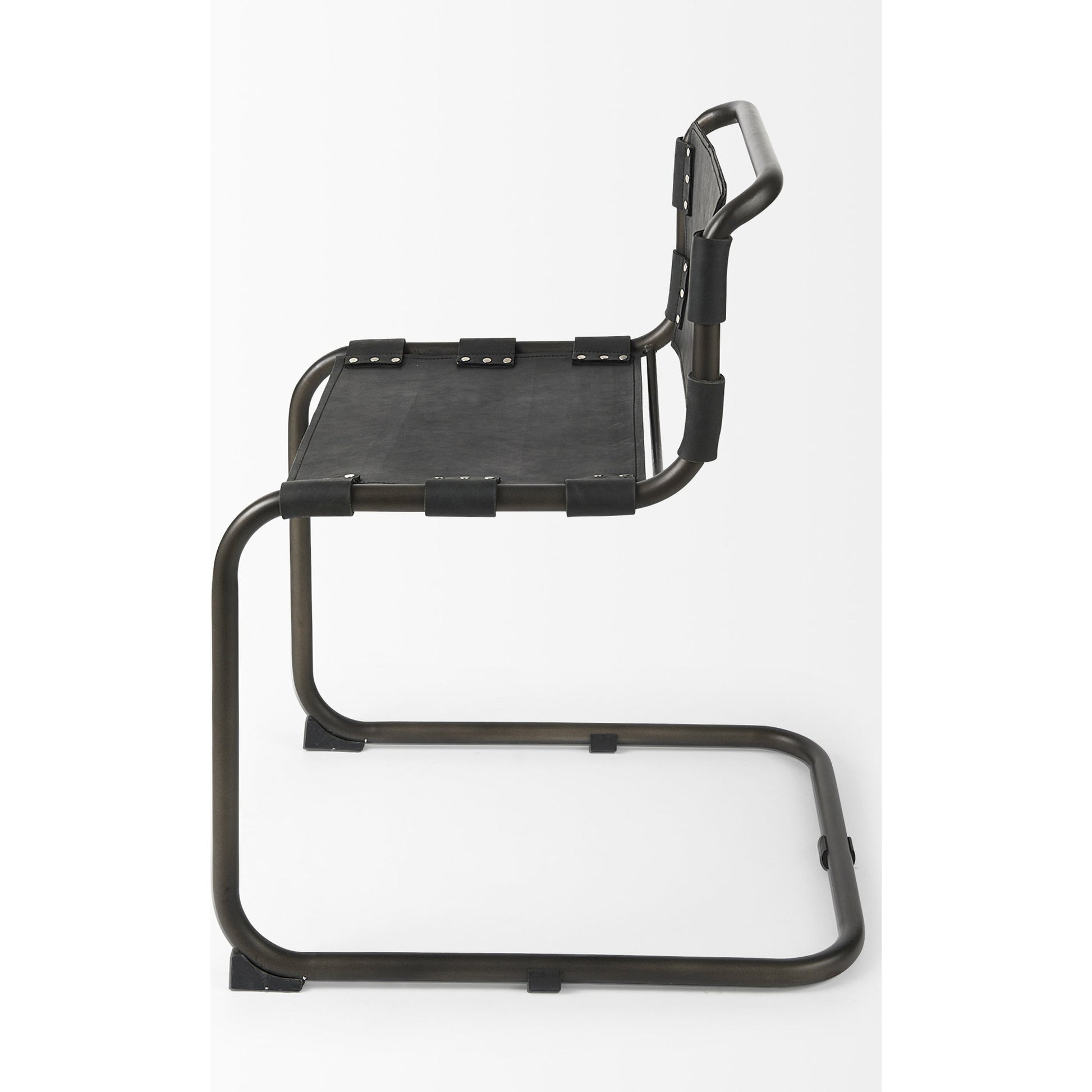 Berbick Dining Chair by Mercana. Made from leather, iron in a unique style.