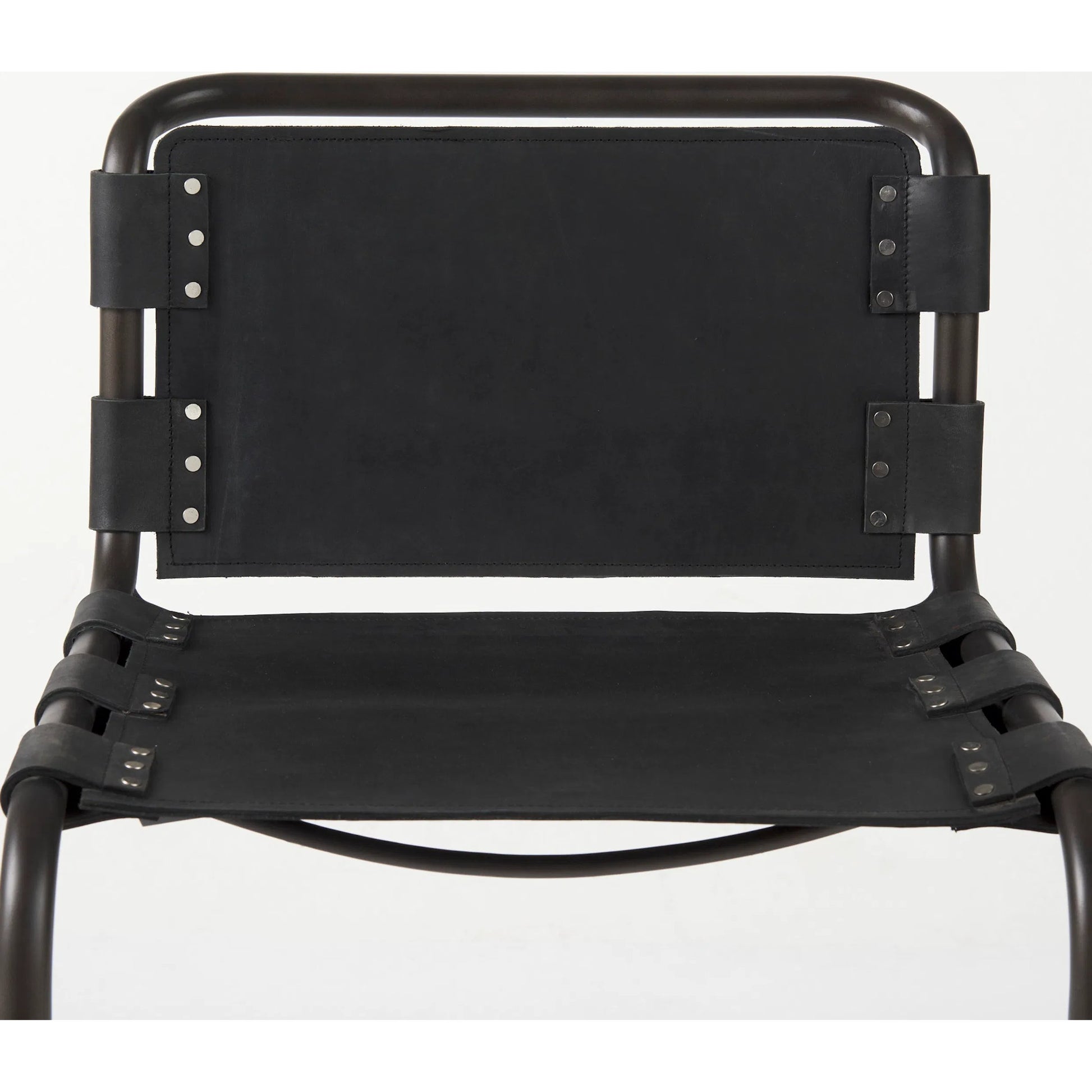 Berbick Dining Chair by Mercana. Made from leather, iron in a unique style.