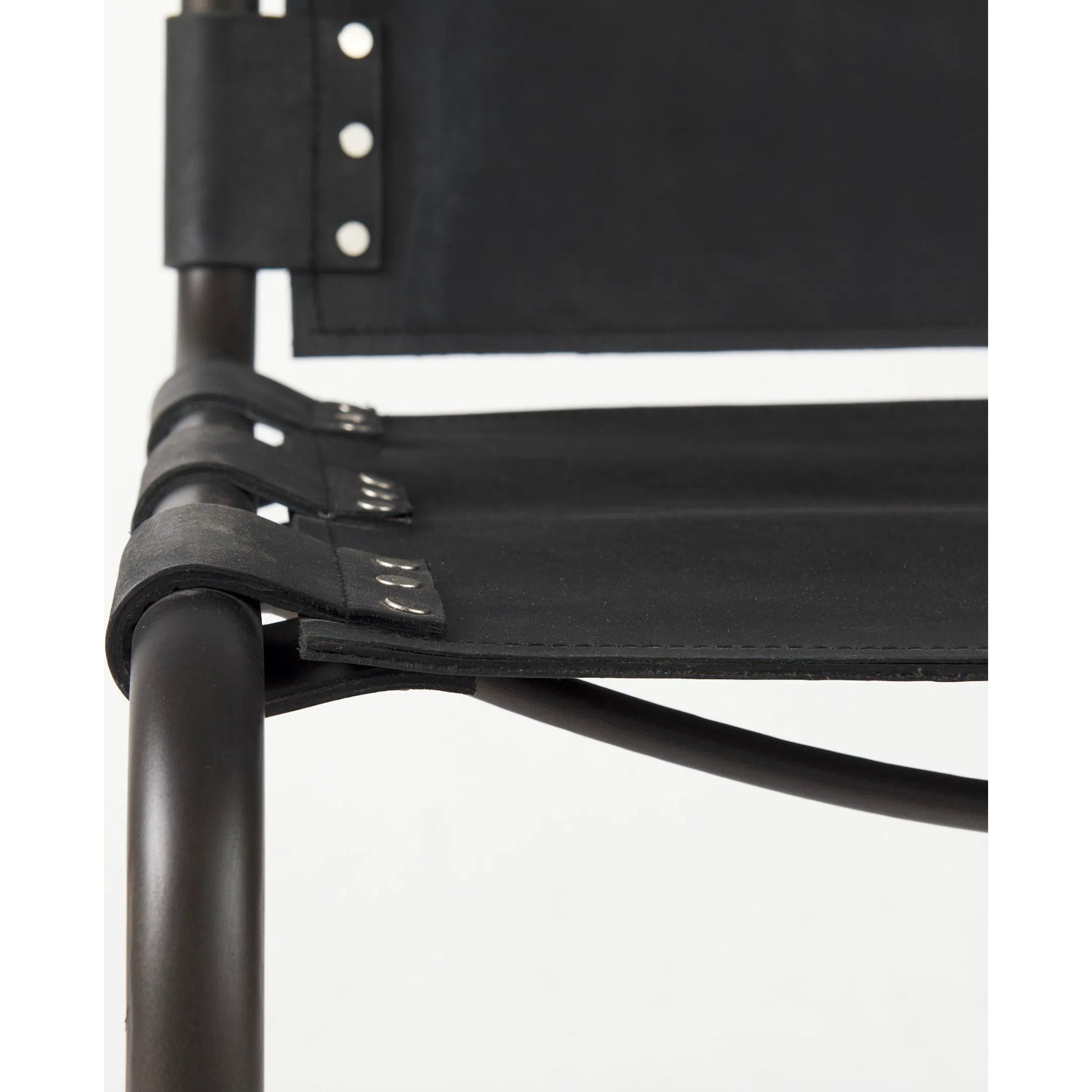 Berbick Dining Chair by Mercana. Made from leather, iron in a unique style.