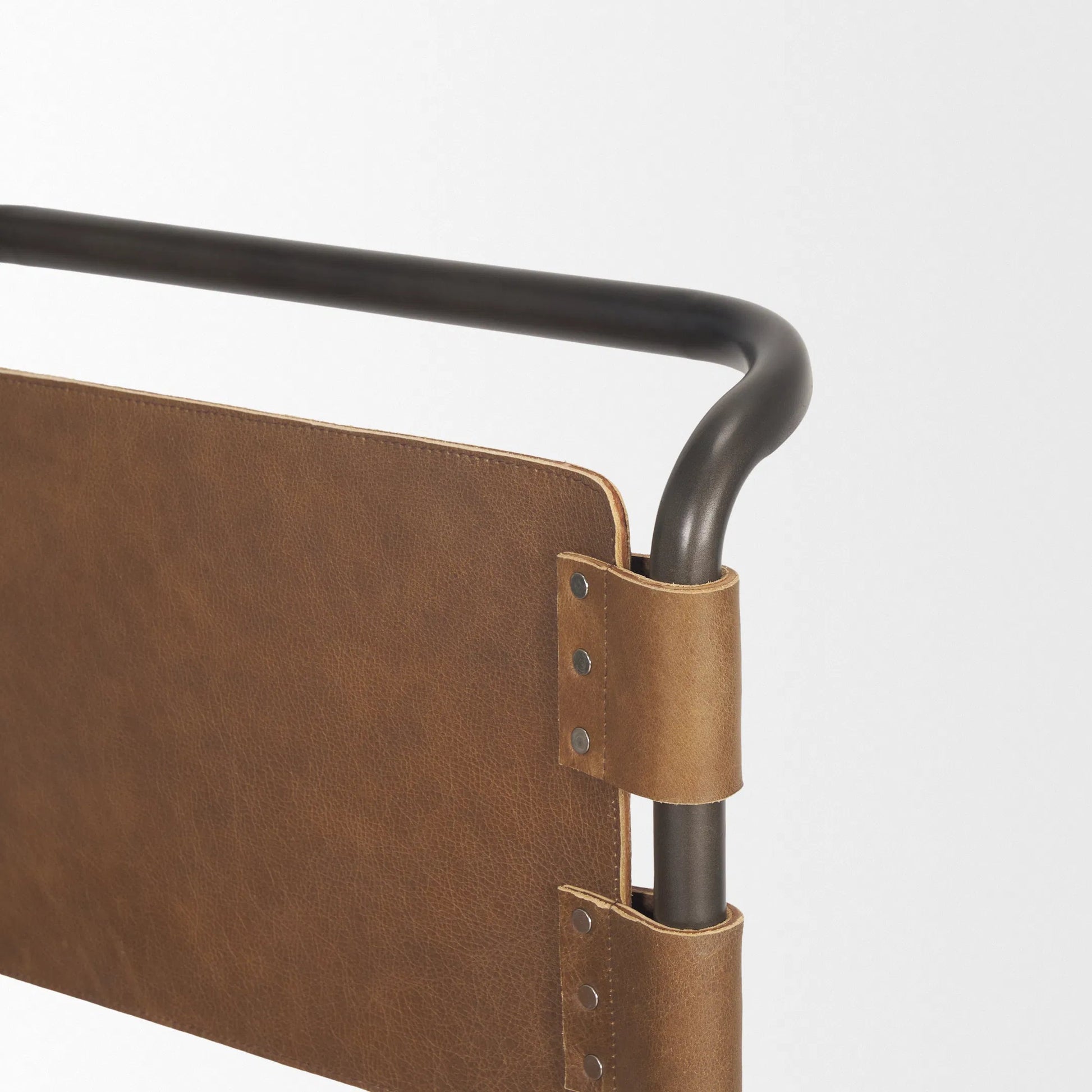 Berbick Dining Chair by Mercana. Made from leather, iron in a unique style.