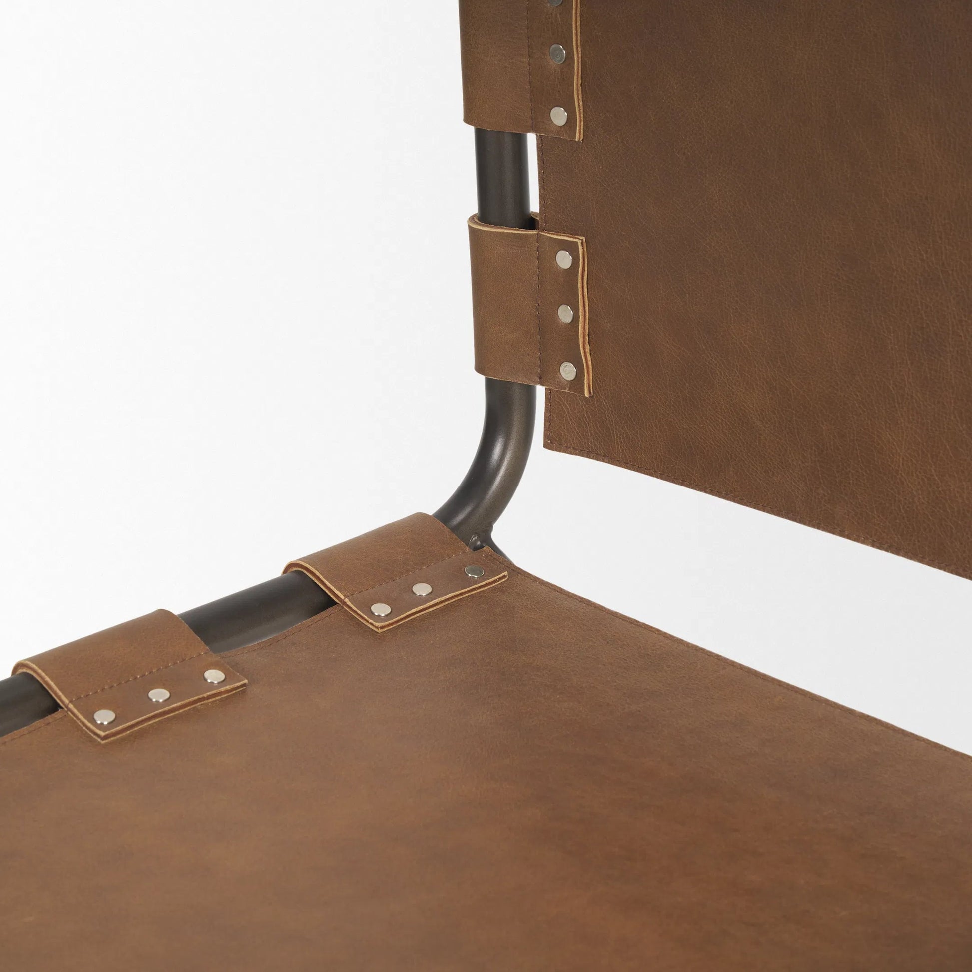 Berbick Dining Chair by Mercana. Made from leather, iron in a unique style.