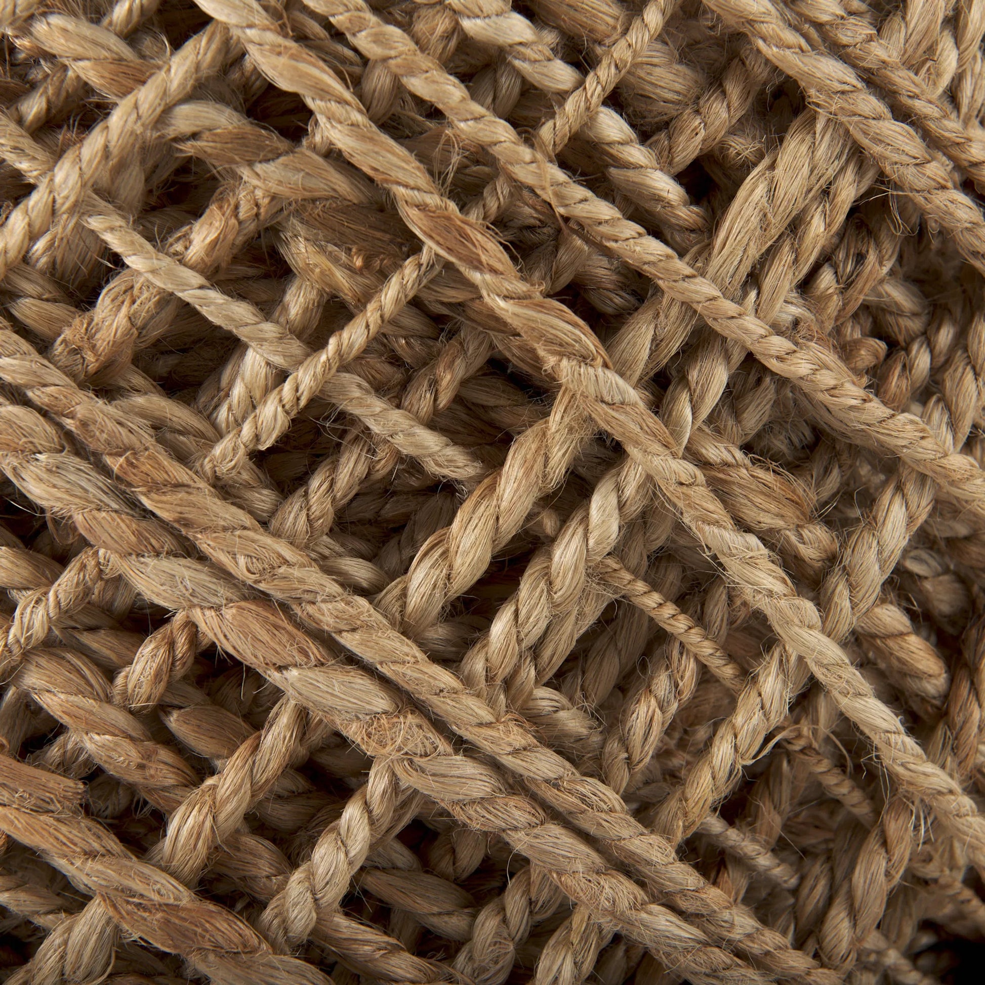 Allium Pouf by Mercana. Made from handwoven wool in a eclectic & global style.
