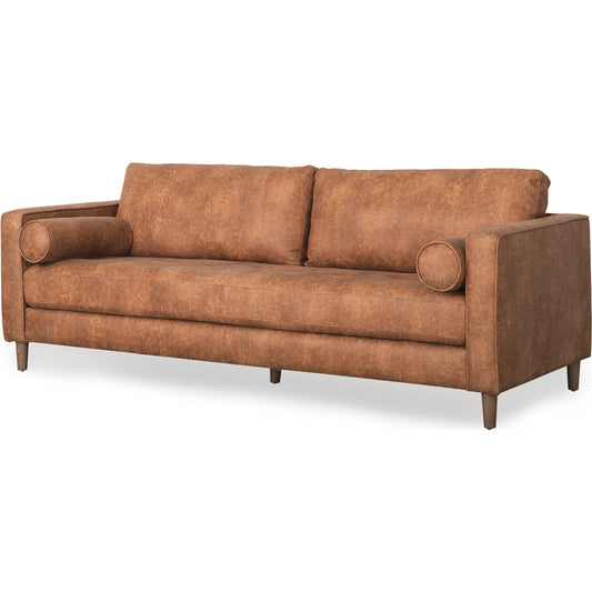 Loretta Sofa by Mercana in red. Made from faux leather in a unique style.