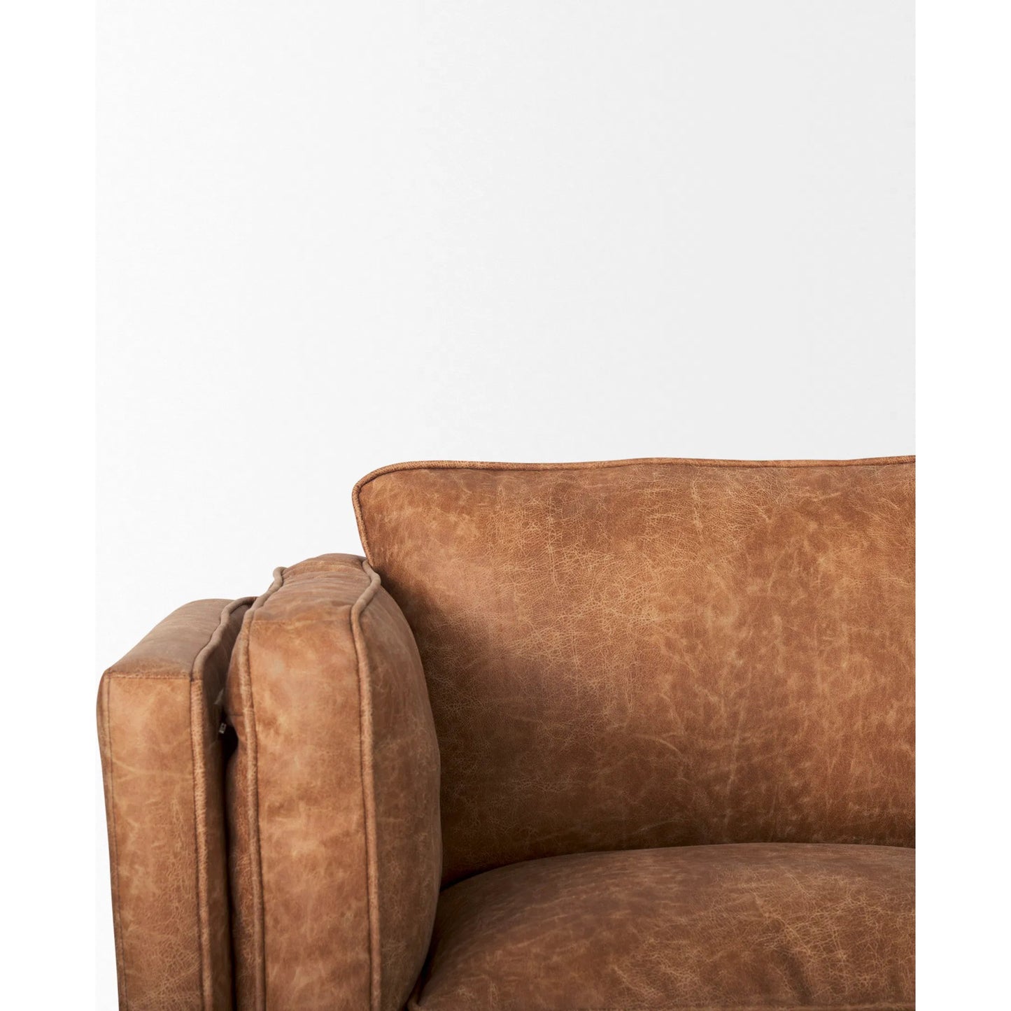 016 SI-2369647 | Closeup | Brooks Leather Sofa by Mercana in cognac. Made from faux leather in a traditional style.