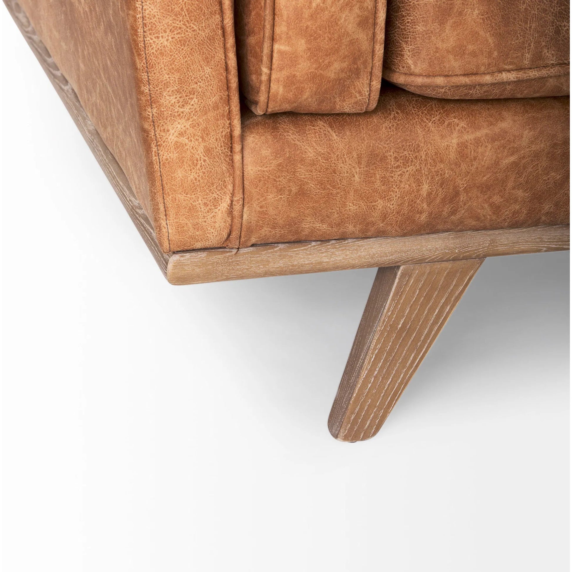 Brooks Leather Sofa by Mercana in cognac. Made from faux leather in a traditional style.