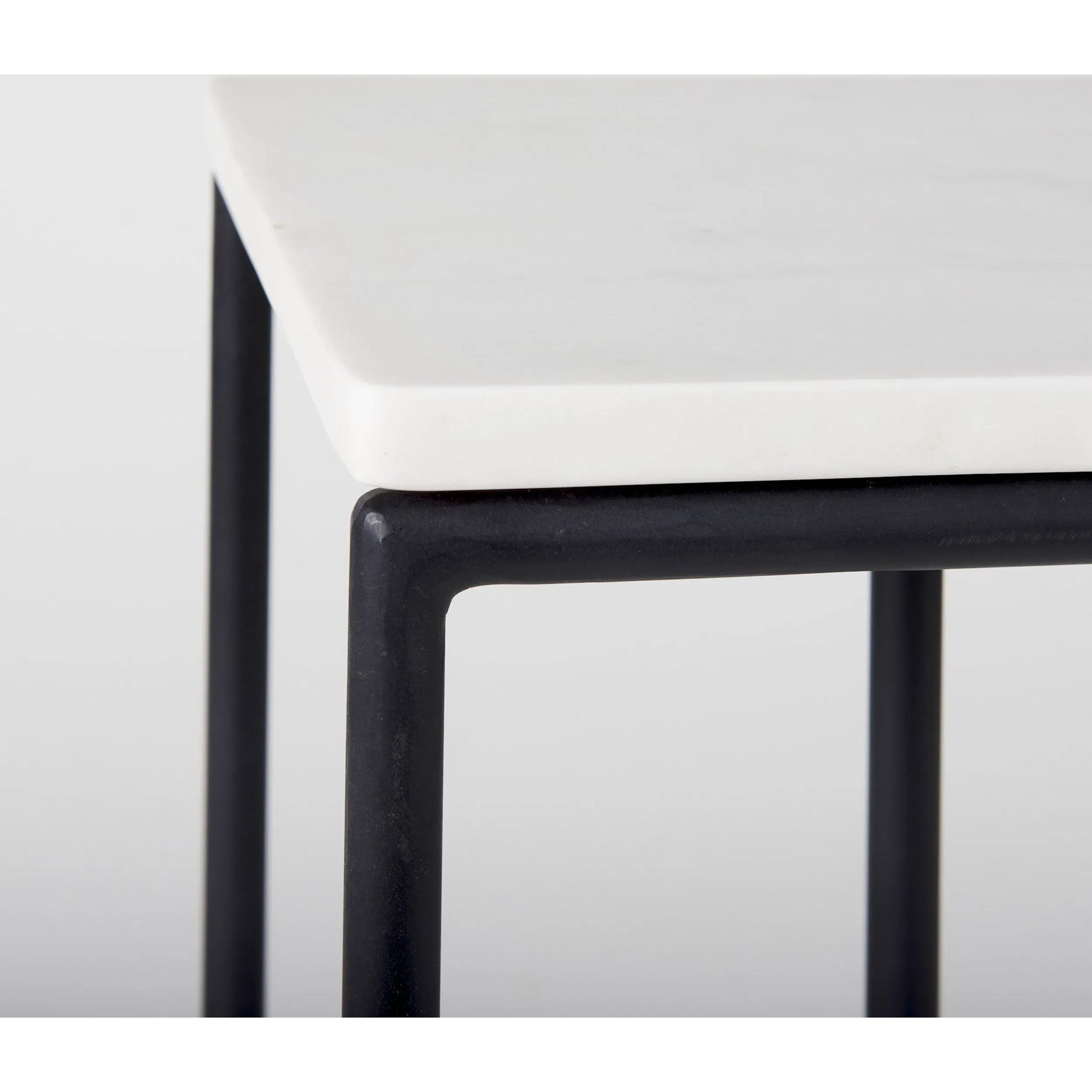 Kyra Side Table by Mercana in black. Made from metal in a unique style.