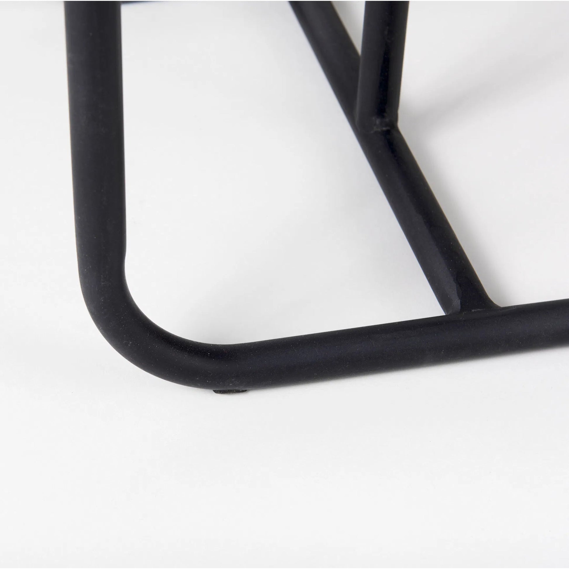 Kyra Side Table by Mercana in black. Made from metal in a unique style.