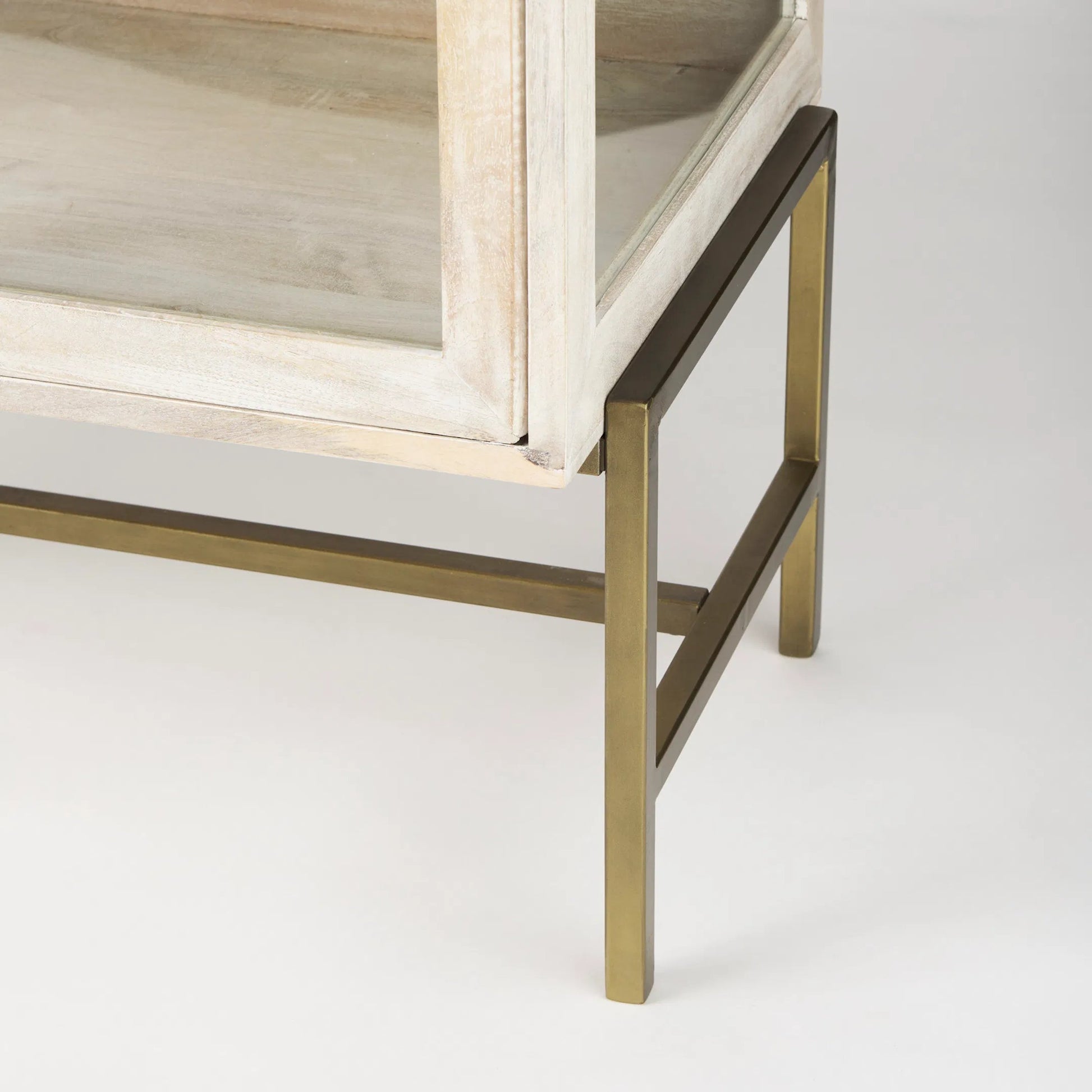 Arelius Accent Cabinet by Mercana. Made from glass, solid wood, steel in a modern style.