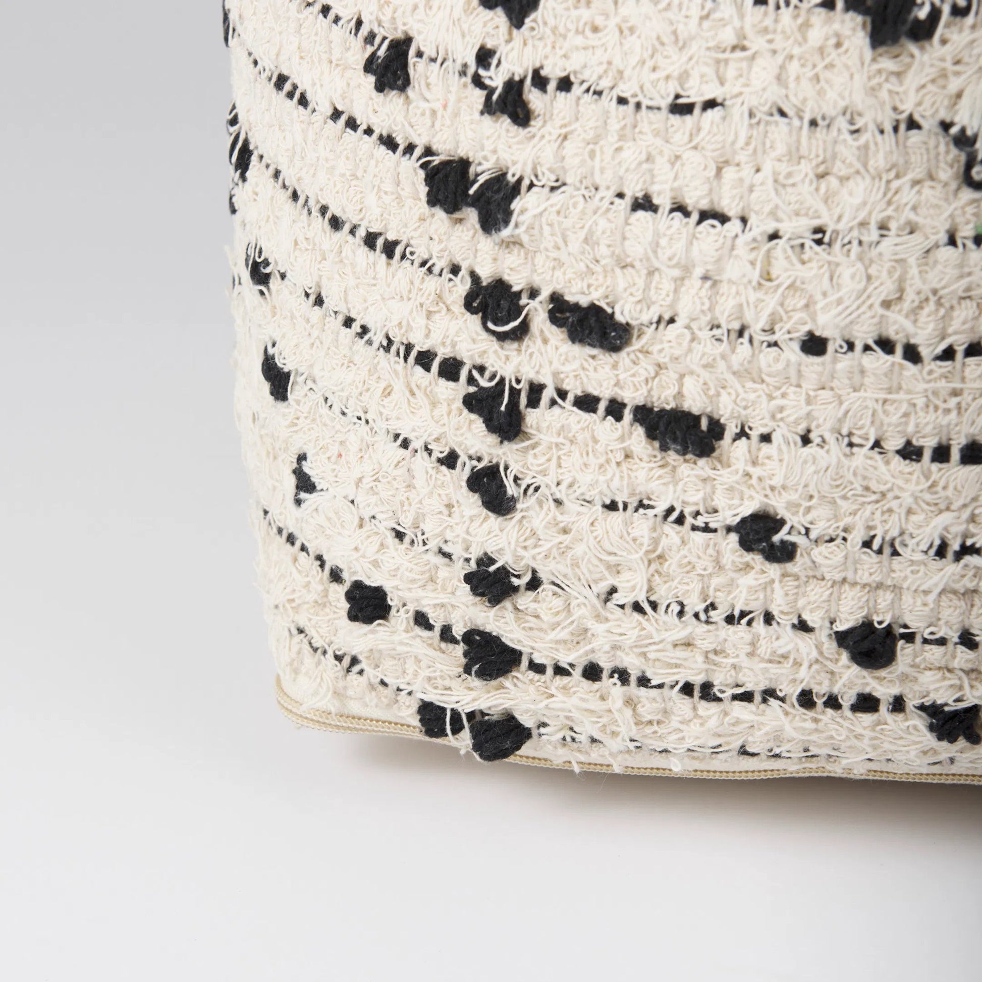 Aaohi Pouf by Mercana in black, cream. Made from cotton in a rustic style.