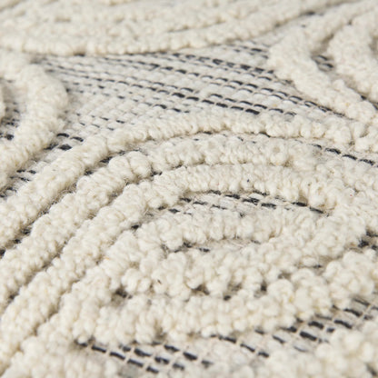 Amaya Pouf by Mercana in cream. Made from wool in a rustic style.