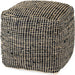 Aalia Pouf by Mercana. Made from leather in a rustic style.