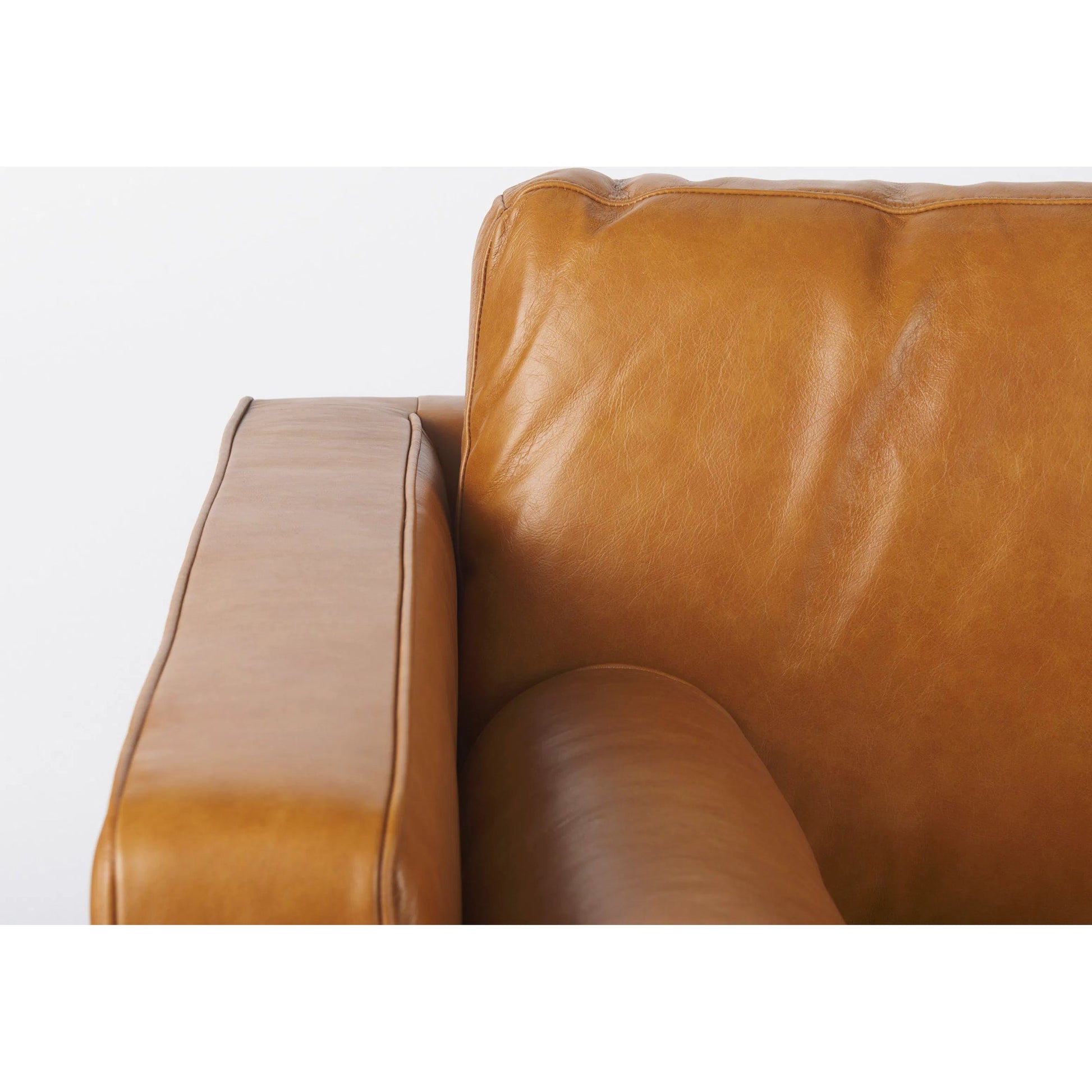 Svend Loveseat by Mercana in tan. Made from genuine leather in a unique style.