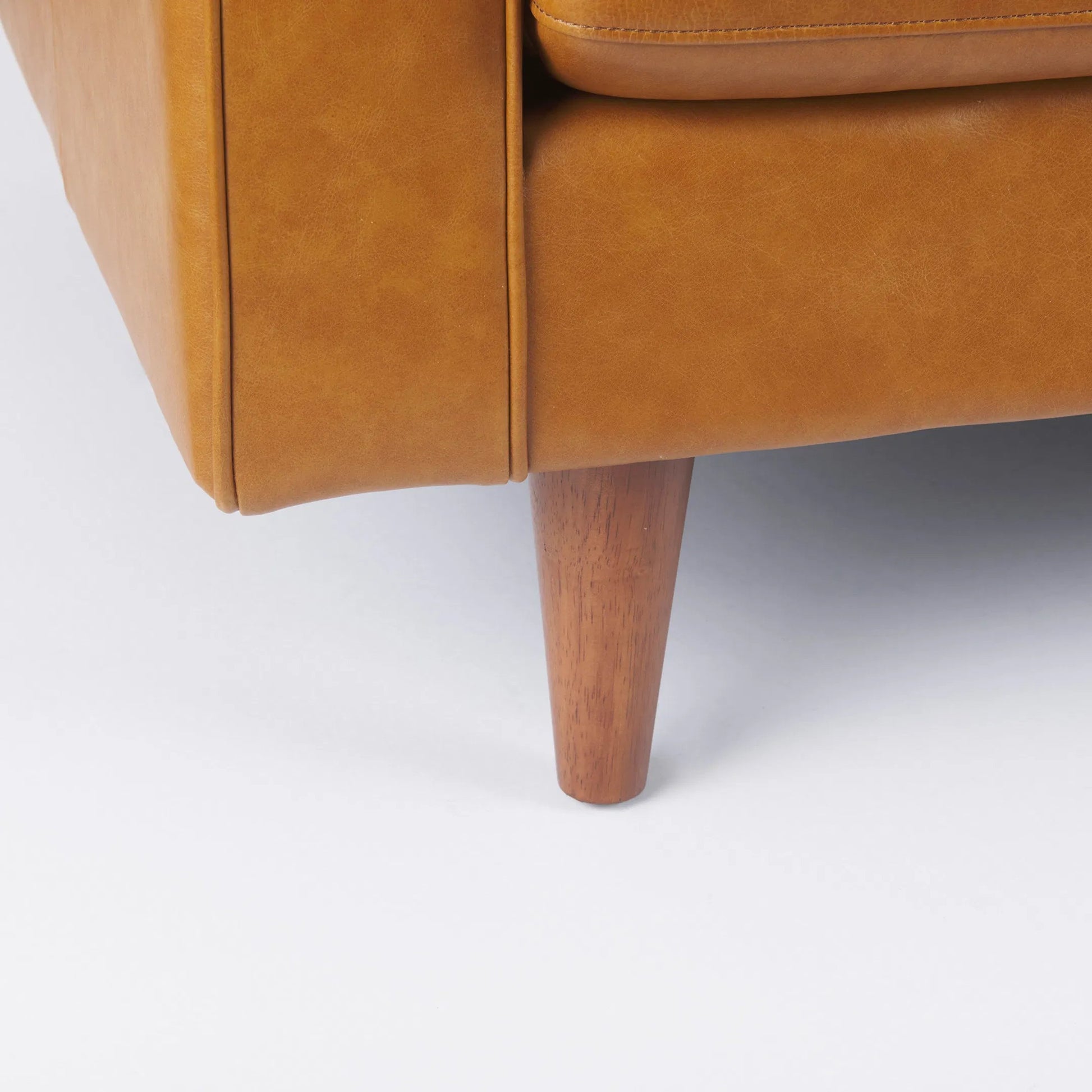 Svend Loveseat by Mercana in tan. Made from genuine leather in a unique style.