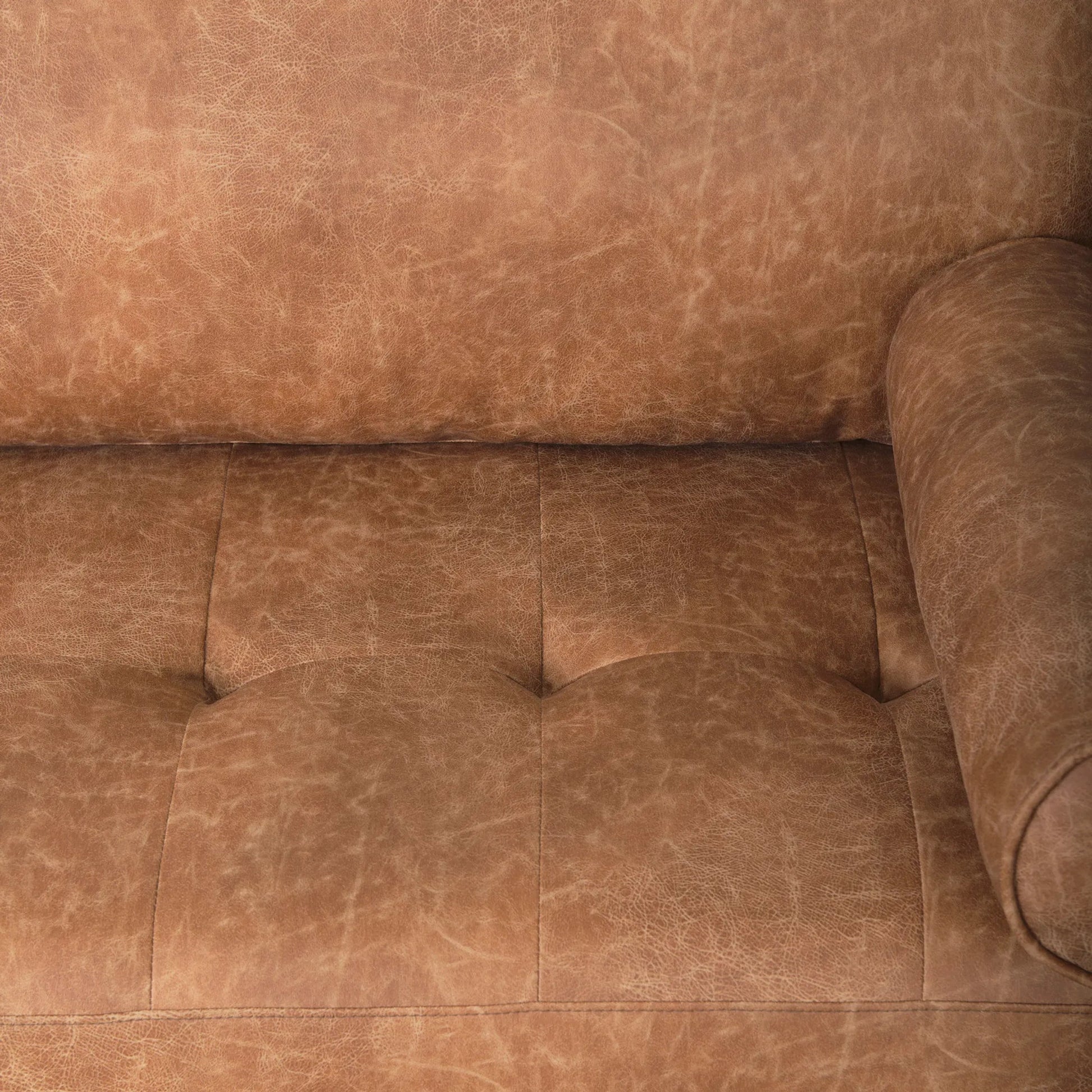 Loretta Sofa by Mercana in red. Made from faux leather in a transitional style.