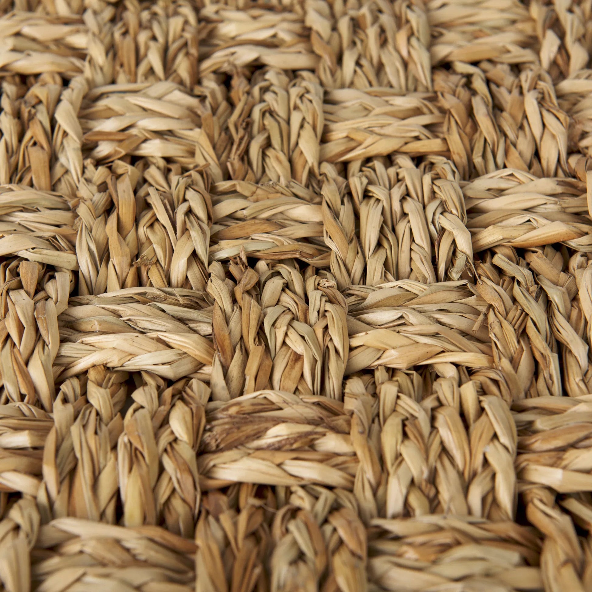 Adele Pouf by Mercana in brown. Made from seagrass in a rustic style.