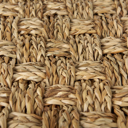 Adele Pouf by Mercana in brown. Made from seagrass in a rustic style.