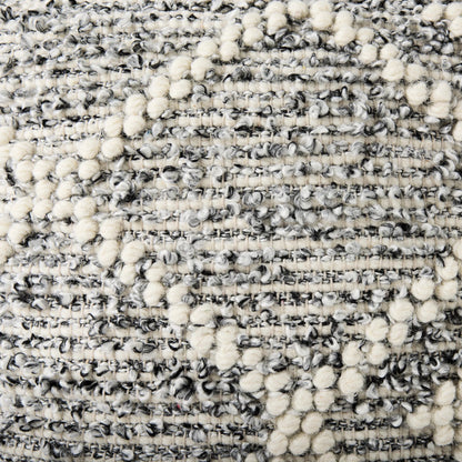 Ekiya Pouf by Mercana in gray, white. Made from wool in a rustic style.