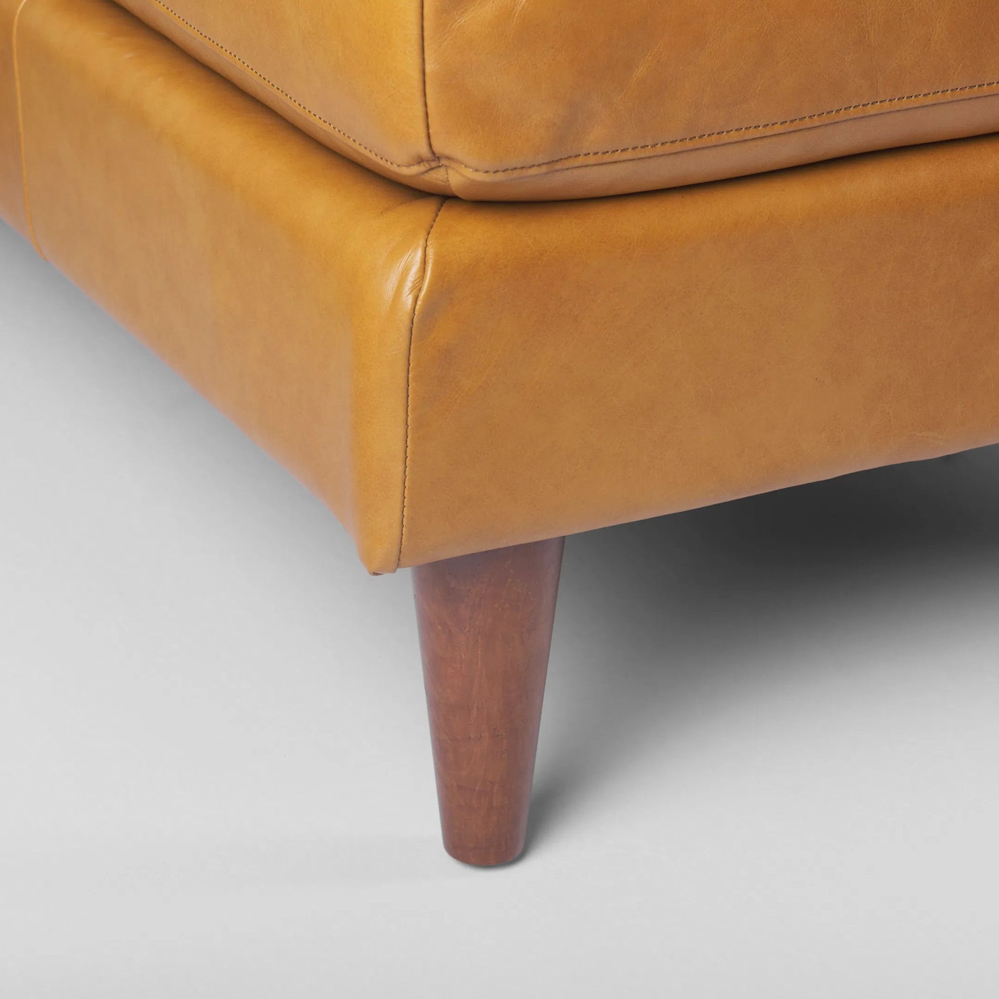 Svend Sectional by Mercana in tan. Made from solid wood in a traditional style.