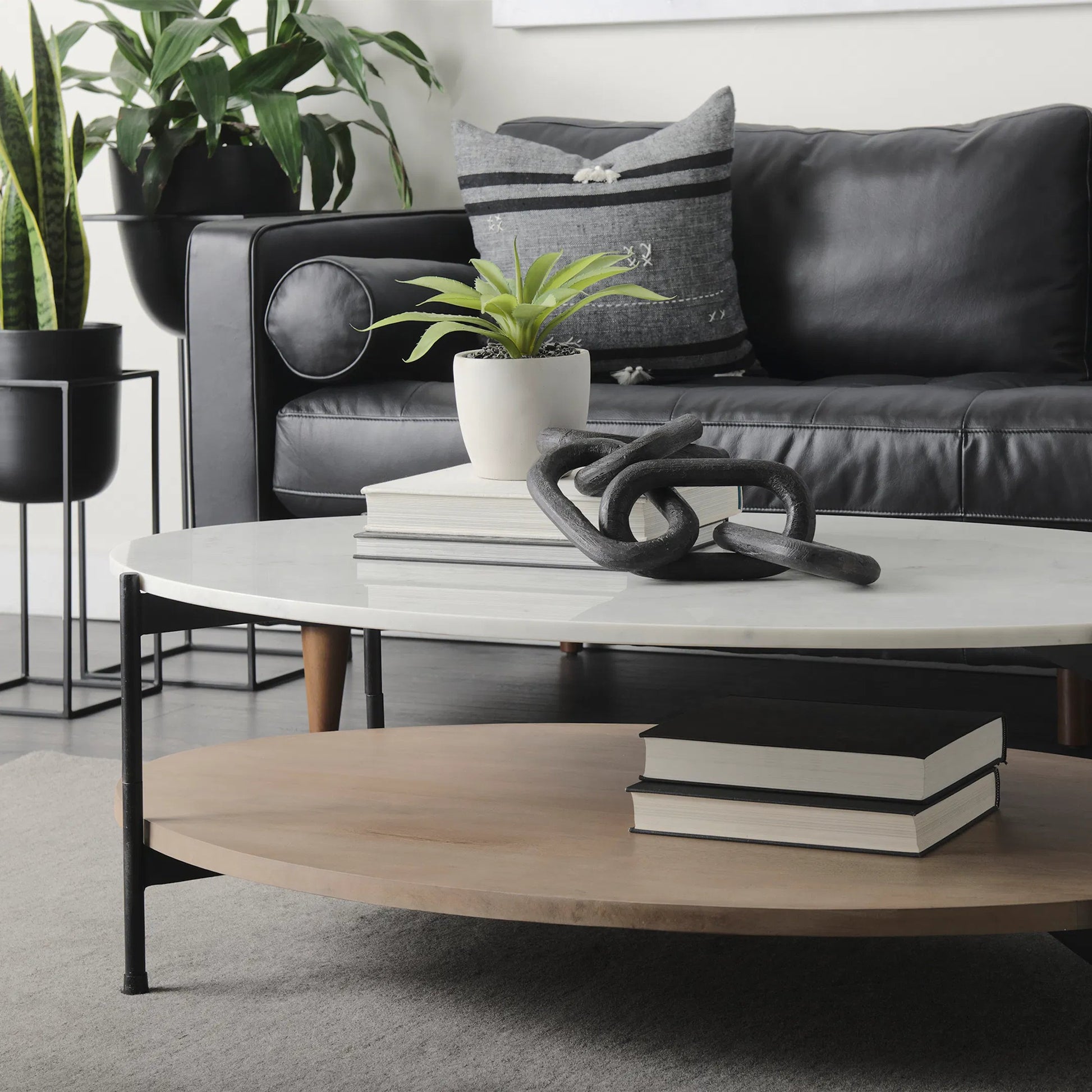 Larkin Oval Coffee Table by Mercana. Made from solid wood in a transitional style.