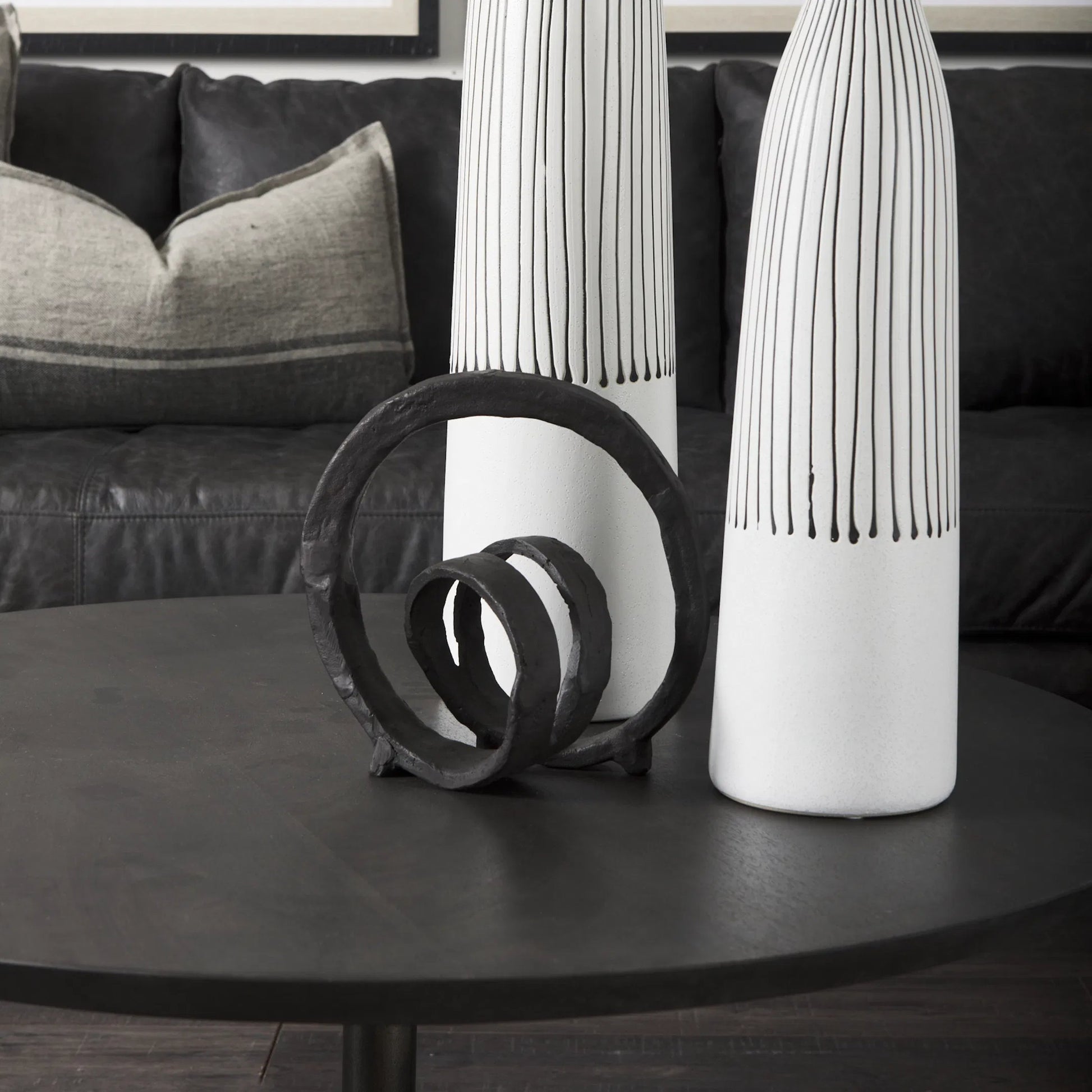 Stanislaw II Infinite Ribbon Sculpture by Mercana in black. Made from metal in a rustic style.