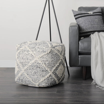 Ekiya Pouf by Mercana in gray, white. Made from wool in a rustic style.
