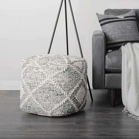 Ekiya Pouf by Mercana in gray, white. Made from wool in a rustic style.