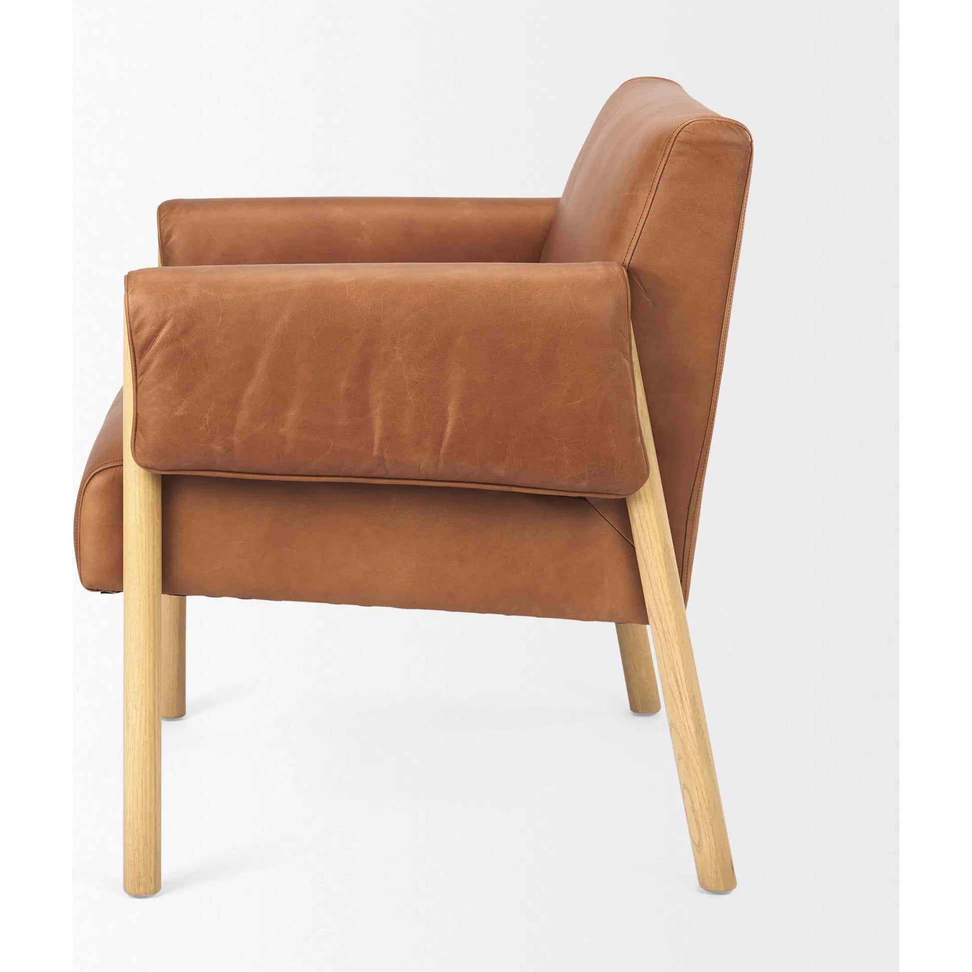 Ashton Faux Leather Accent Chair by Mercana. Made from fabric in a traditional style.