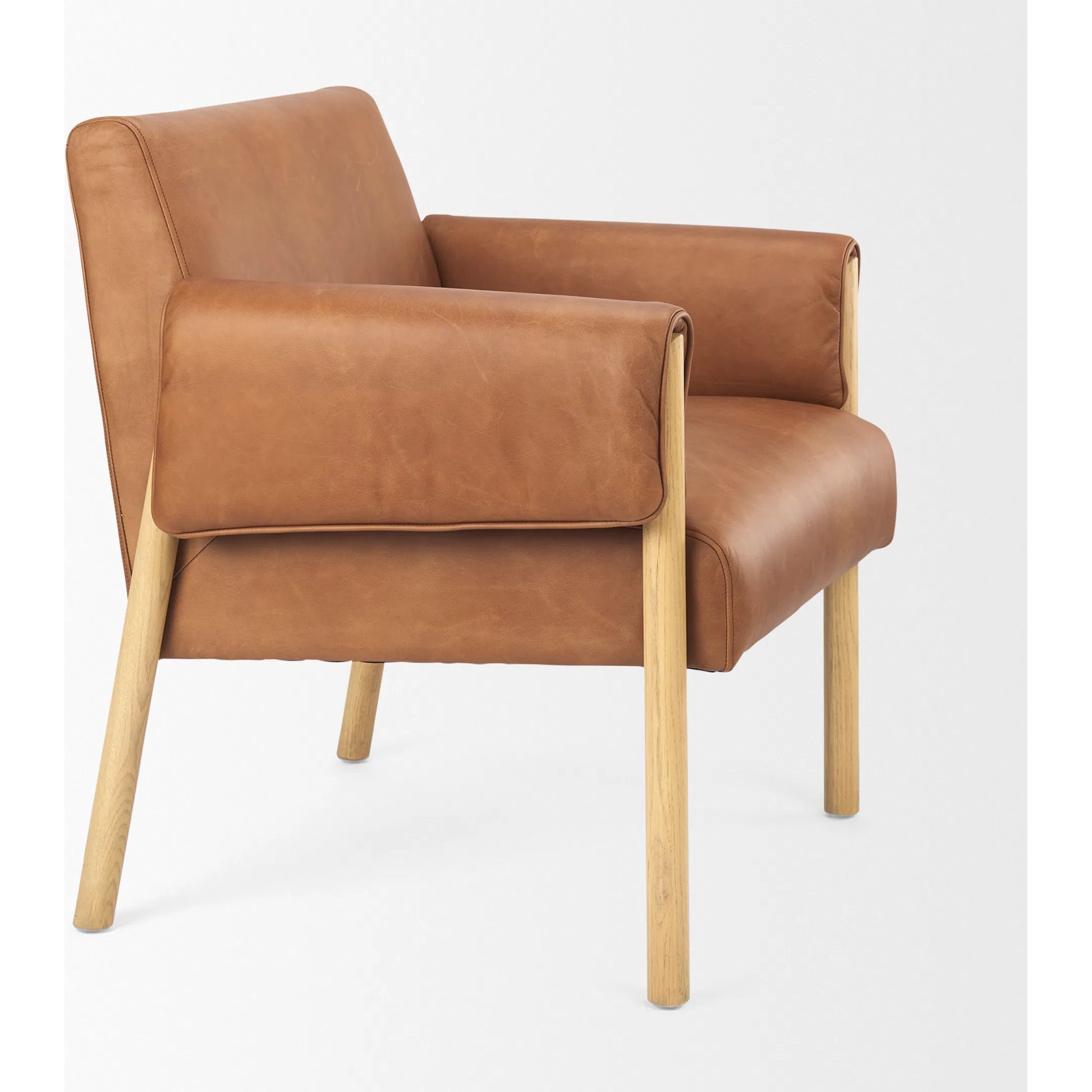 Ashton Faux Leather Accent Chair by Mercana. Made from fabric in a traditional style.