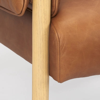 Ashton Faux Leather Accent Chair by Mercana. Made from fabric in a traditional style.