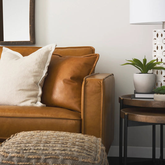 D'Arcy Loveseat by Mercana in tan. Made from genuine leather in a unique style.