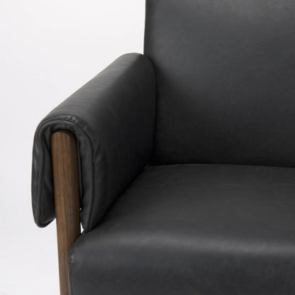 Ashton Faux Leather Accent Chair by Mercana. Made from fabric in a traditional style.