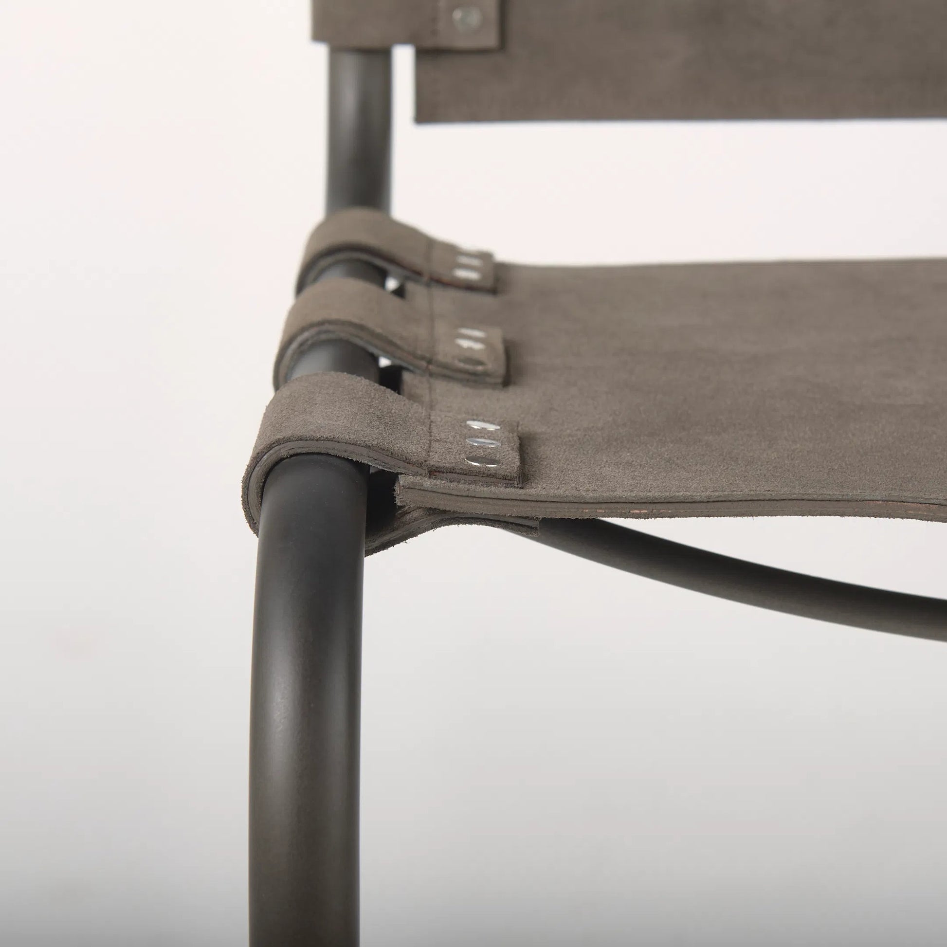 Berbick Dining Chair by Mercana. Made from leather, iron in a unique style.