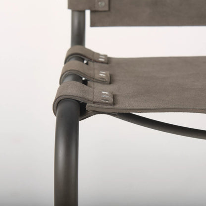 Berbick Dining Chair by Mercana. Made from leather, iron in a unique style.